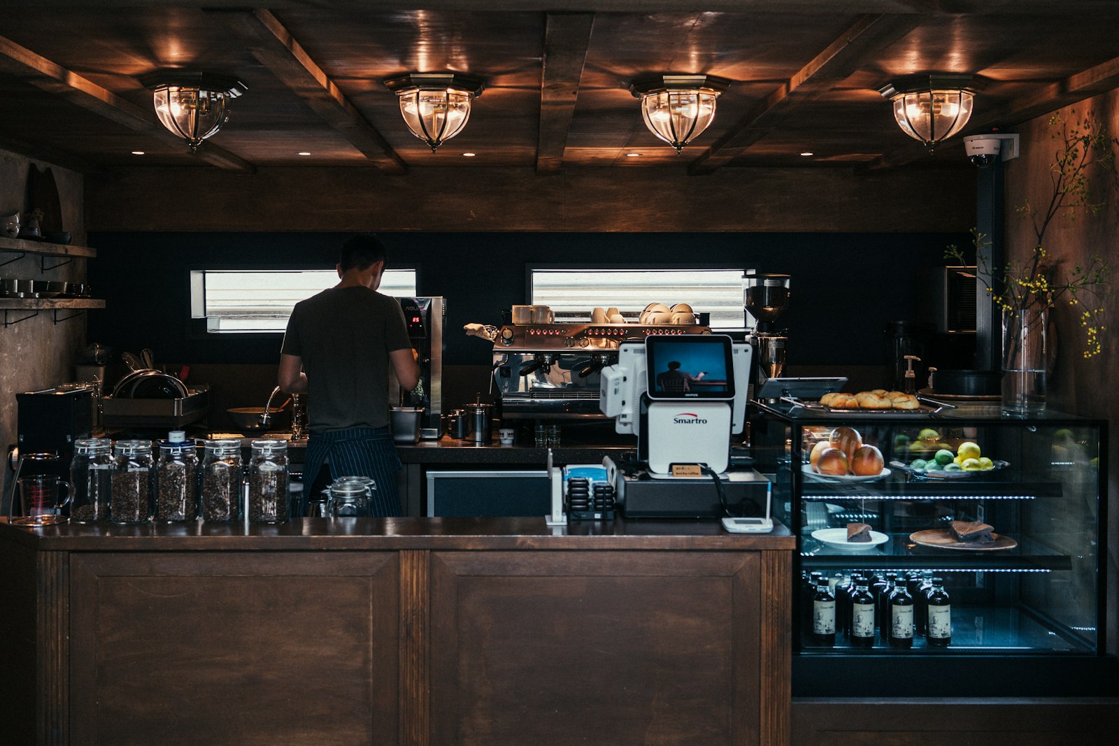 Dark wood coffee bar and back counter