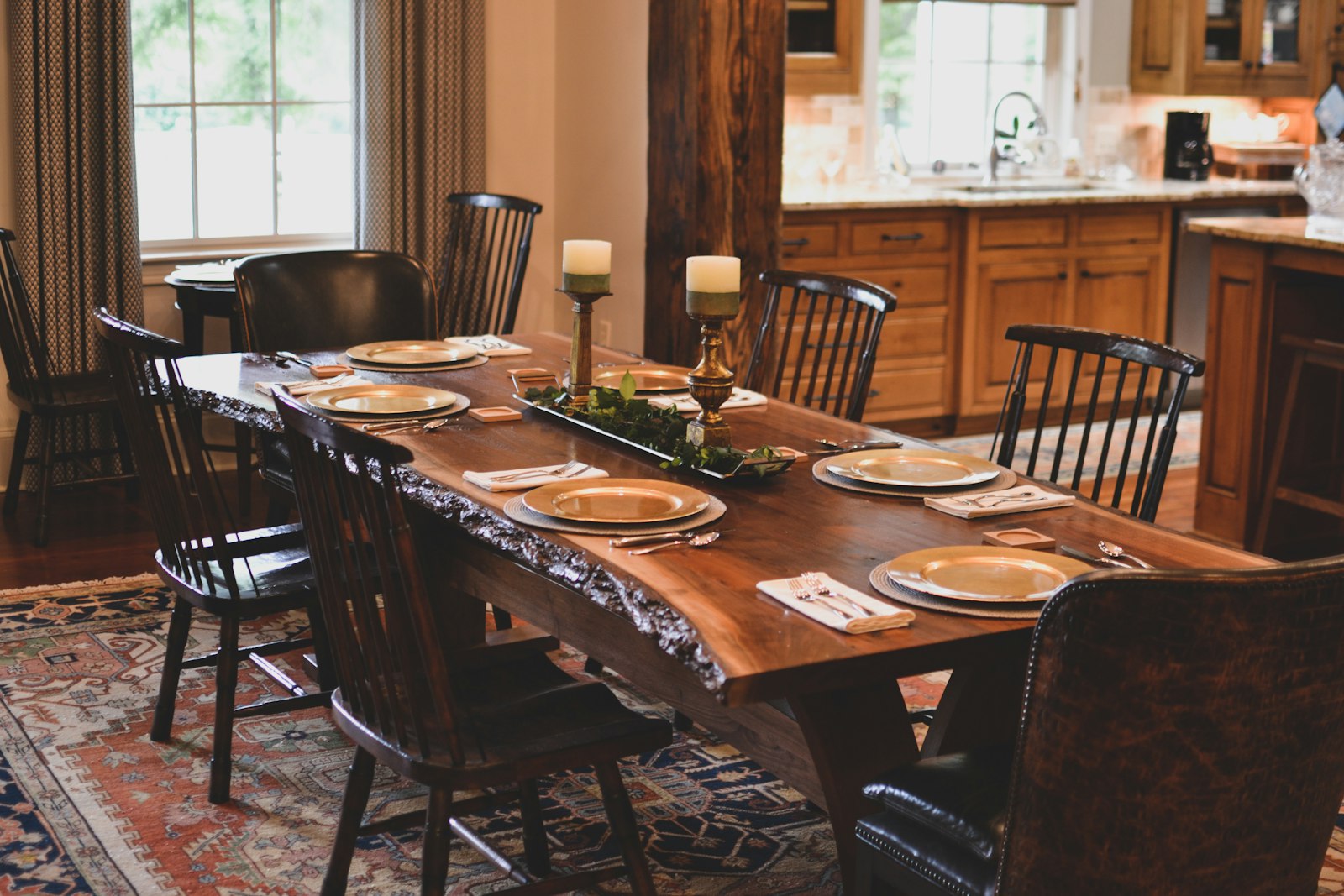 Live-edge walnut dining table with black chairs