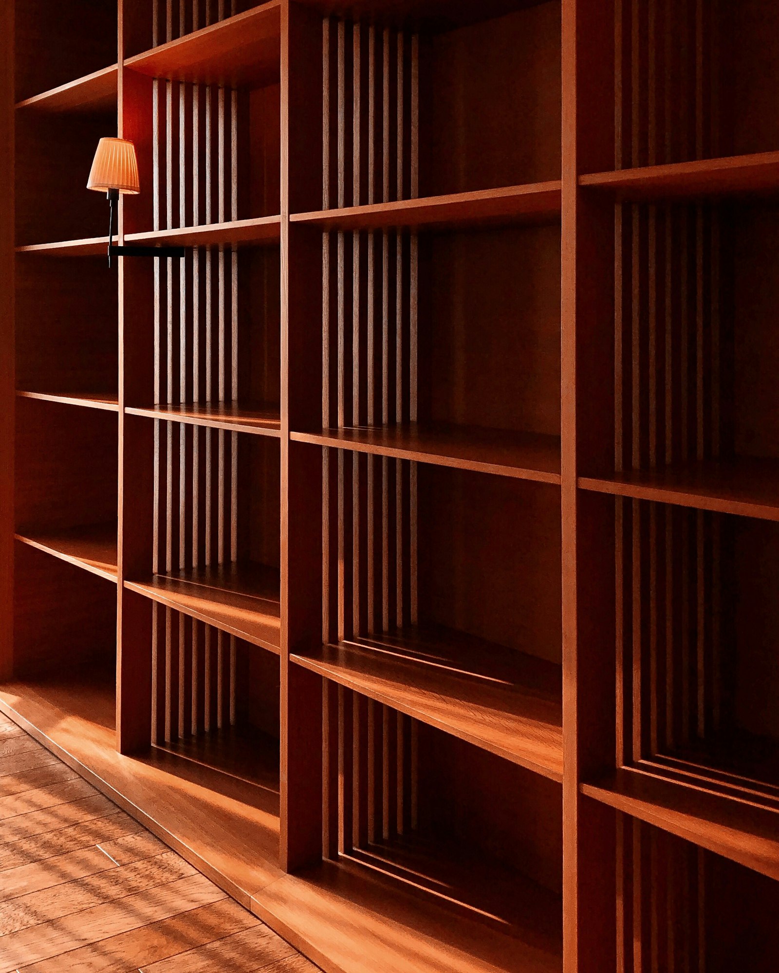 Handcrafted hardwood shelving with slatted backs