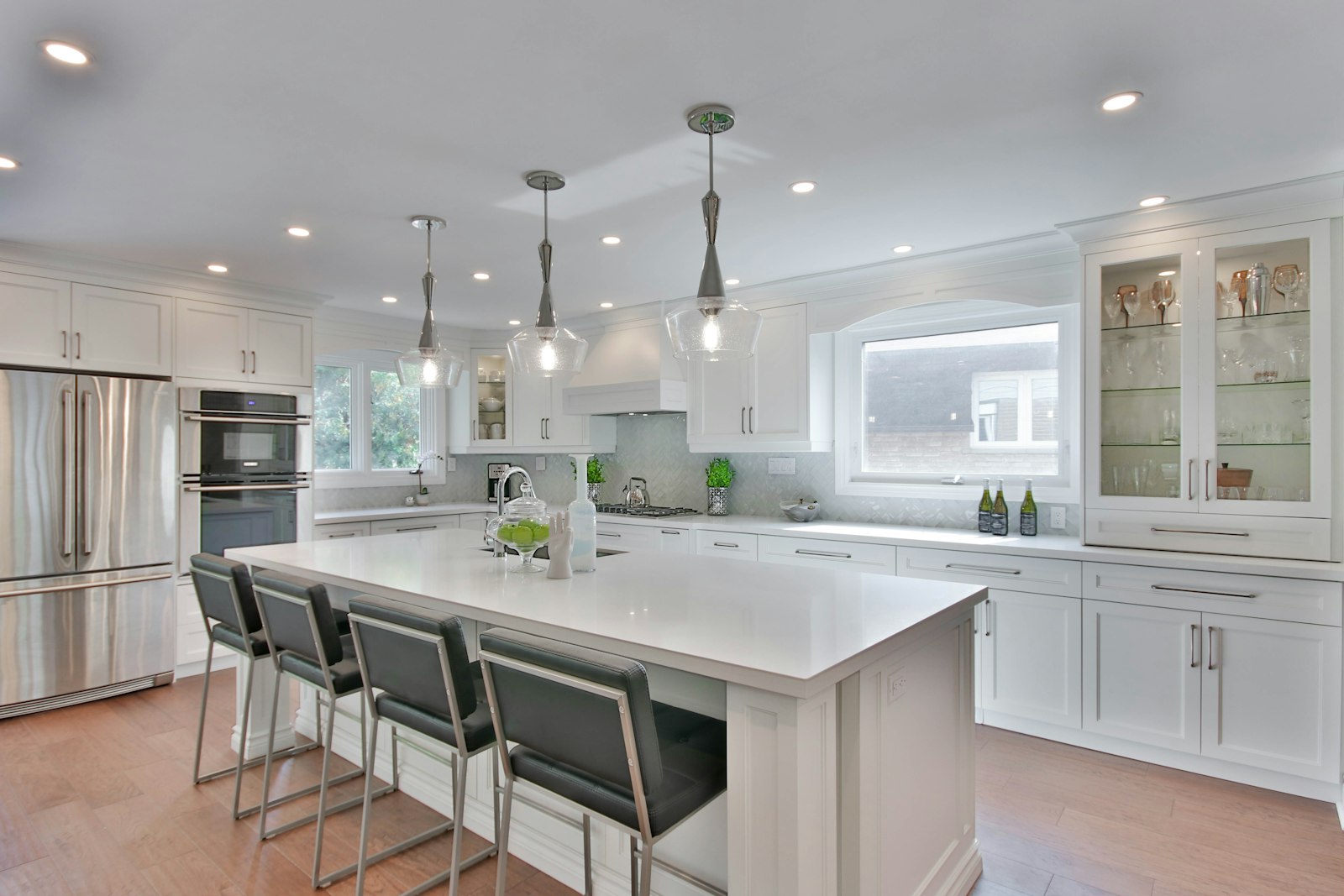 White kitchen with large seating island