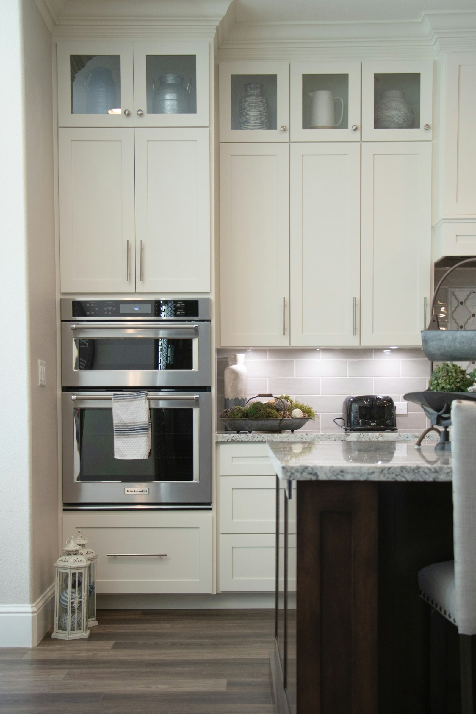 Cream cabinetry with crown molding detail
