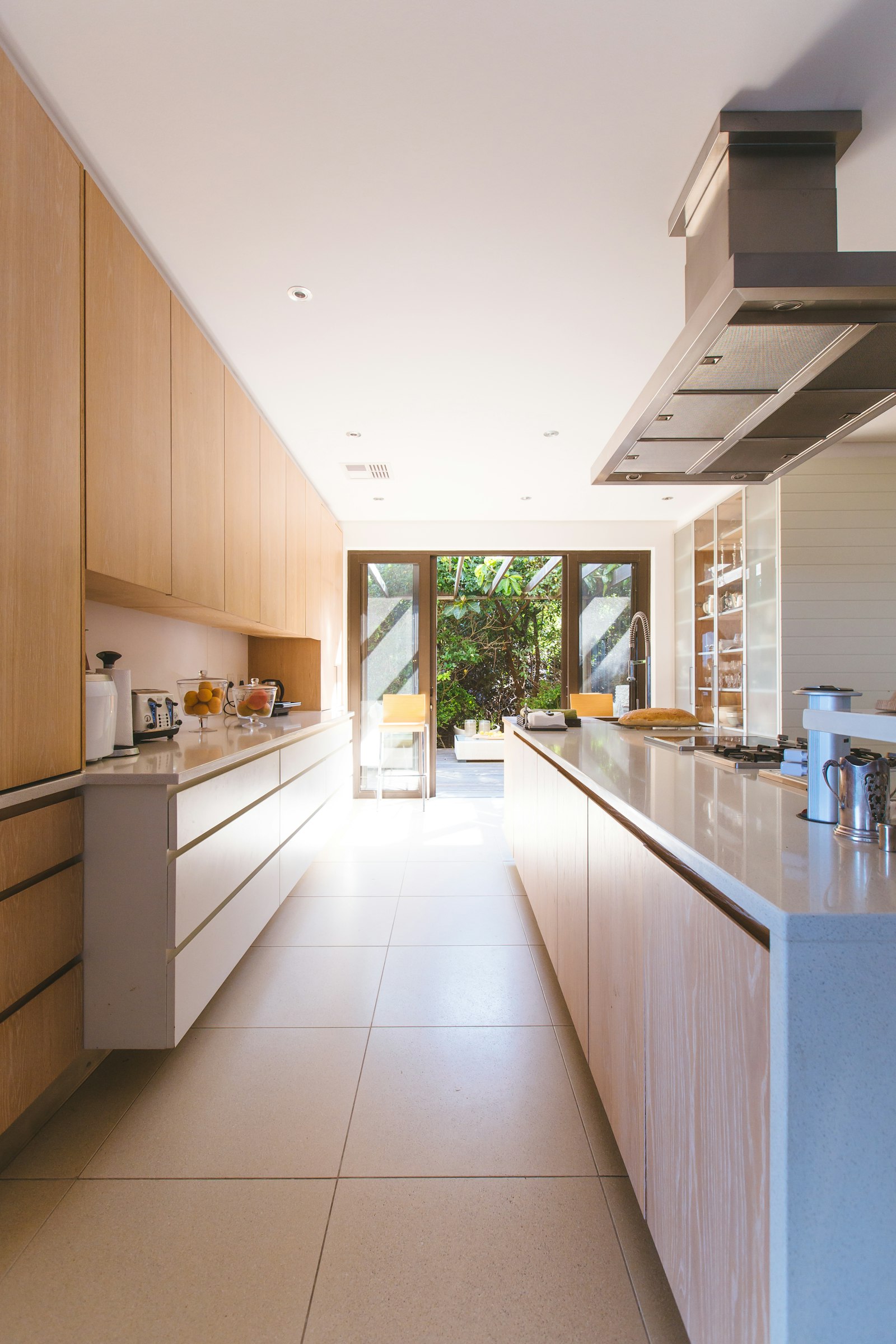 Light wood modern galley kitchen